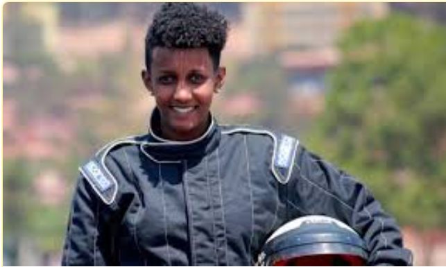 The reason why Miss Kalimpinya postponed participating in the car race.